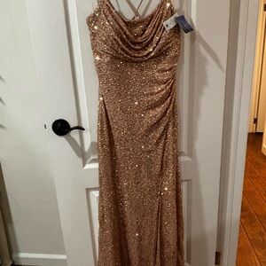 Rose gold sparkling dress with a low leg cut